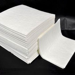 photo of stack of absorbent pads